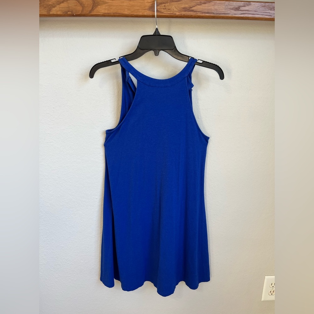 Blue dress. Sleeveless.